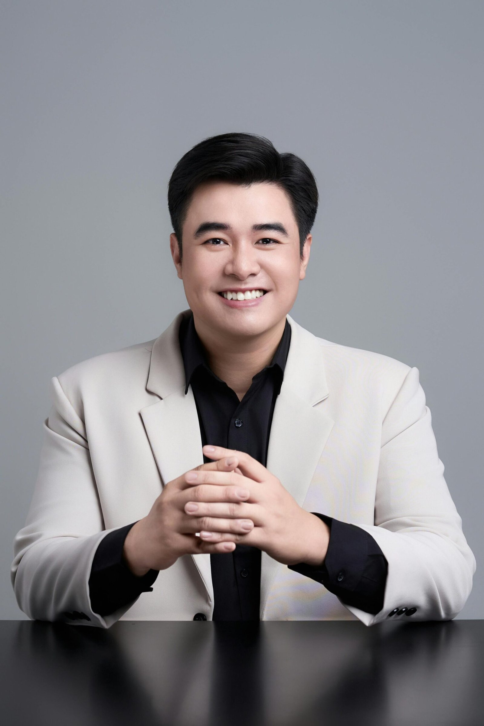 Smiling hiring manager ready to connect with qualified candidates and support recruitment process.